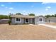 Inviting single-story home with a manicured lawn and charming curb appeal at 2214 Selkirk St, Valrico, FL 33594