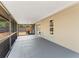 Screened porch looking toward the yard, with access to inside the home at 2214 Selkirk St, Valrico, FL 33594