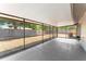 Large screened porch offering a relaxing outdoor space with views of the backyard at 2214 Selkirk St, Valrico, FL 33594