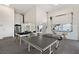 Finished basement showing recreation area with water views and epoxy floor at 2417 Sunset Vista Dr, Spring Hill, FL 34607