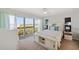 Enjoy this light and bright bedroom with a sliding door to the outside balcony at 2417 Sunset Vista Dr, Spring Hill, FL 34607