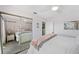 Charming bedroom with mirrored closet doors and soft decor at 2417 Sunset Vista Dr, Spring Hill, FL 34607