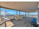 Covered patio showing deck, metal spiral staircase and expansive water views at 2417 Sunset Vista Dr, Spring Hill, FL 34607