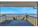 Outdoor patio featuring lounge area with scenic water views and blue sky at 2417 Sunset Vista Dr, Spring Hill, FL 34607