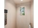 Residential elevator showcasing beach themed decor and safety features at 2417 Sunset Vista Dr, Spring Hill, FL 34607