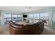 Inviting living room with water views and sliding doors to the deck at 2417 Sunset Vista Dr, Spring Hill, FL 34607