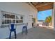 This beautiful patio features an outdoor shower, a beautiful bar, and connect four at 2417 Sunset Vista Dr, Spring Hill, FL 34607