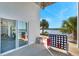 Enjoy outdoor living on this patio with connect-four and a slider into the garage at 2417 Sunset Vista Dr, Spring Hill, FL 34607