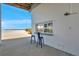 This beautiful patio features an outdoor shower and a beautiful bar with a view at 2417 Sunset Vista Dr, Spring Hill, FL 34607