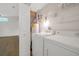 Functional laundry room featuring a washer, dryer, and storage shelves at 2907 Mingo Dr, Land O Lakes, FL 34639
