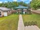 Neighborhood playground offers children a shaded, safe area to play, bike rack, and nearby seating at 2907 Mingo Dr, Land O Lakes, FL 34639