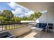 Inviting balcony with comfortable seating, perfect for enjoying the peaceful neighborhood and sunny weather at 30 Turner St # 202, Clearwater, FL 33756