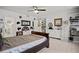 Bright bedroom with a large bed and a view of the kitchen at 30 Turner St # 202, Clearwater, FL 33756