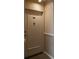 Neutral-colored unit door with the number 202 and a decorative knocker at 30 Turner St # 202, Clearwater, FL 33756