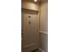Neutral-colored unit door with the number 202 and a decorative knocker at 30 Turner St # 202, Clearwater, FL 33756