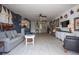 Open living room featuring hardwood floors, stylish decor, connecting kitchen for modern living at 30 Turner St # 202, Clearwater, FL 33756