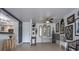 Bright living room features stylish decor, fan, and views to the kitchen, for modern comfort at 30 Turner St # 202, Clearwater, FL 33756