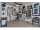 Bright living room featuring stylish decor, artwork, and modern ceiling fan at 30 Turner St # 202, Clearwater, FL 33756