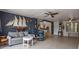 Spacious living room showcases neutral tones, ceiling fan, white oak floors and open floor plan at 30 Turner St # 202, Clearwater, FL 33756