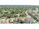 Beautiful aerial view of homes in a wooded community at 3585 Torino Ln, Palm Harbor, FL 34683