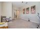 Bedroom featuring plush carpet, a ceiling fan and connecting door leading to additional room at 3585 Torino Ln, Palm Harbor, FL 34683