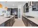 Modern kitchen featuring sleek countertops, and stainless steel appliances at 3585 Torino Ln, Palm Harbor, FL 34683