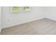 Bedroom with neutral carpet, natural light and crisp white trim at 37202 Clinch Cir, Zephyrhills, FL 33540