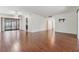 Spacious living room with wood-look tile floors, ceiling fan and sliding glass doors to the outside at 4002 Cypress Ct # 4002, Tampa, FL 33618