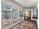 Enclosed brick patio with screened in enclosure at 4002 Cypress Ct # 4002, Tampa, FL 33618