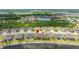 Stunning aerial shot of the house overlooking a tranquil pond in a well-maintained community at 4220 Barletta Ct, Wesley Chapel, FL 33543