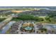 A captivating aerial view showcasing a luxurious community pool nestled within an expansive residential neighborhood at 4220 Barletta Ct, Wesley Chapel, FL 33543