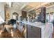 Lobby area with a chandelier, hardwood floors, granite counters, and a piano at 4220 Barletta Ct, Wesley Chapel, FL 33543