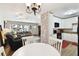 Cozy dining room with a view into the living room and kitchen at 4610 W Mcelroy Ave, Tampa, FL 33611