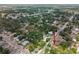Beautiful aerial shot of the property nestled in a tree-filled neighborhood at 4803 Highland, Tampa, FL 33603