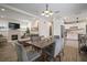Open-concept living area showcases a fireplace and flows into dining and modern kitchen at 4803 Highland, Tampa, FL 33603