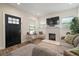 Bright living room with fireplace, modern finishes and a neutral color palette at 4803 Highland, Tampa, FL 33603