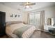 Serene primary bedroom featuring a ceiling fan, makeup vanity, and neutral decor at 4803 Highland, Tampa, FL 33603