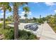 Community picnic area with tables and grills, perfect for outdoor gatherings and enjoyment at 5068 Little Stream Ln, Wesley Chapel, FL 33545