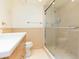 Bathroom featuring a vanity, modern finishes and a tiled shower with glass door at 5729 Puerta Del Sol S Blvd # 185, St Petersburg, FL 33715