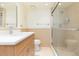 Bathroom featuring a vanity, modern finishes and a tiled shower with glass door at 5729 Puerta Del Sol S Blvd # 185, St Petersburg, FL 33715