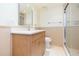 Bathroom featuring a vanity, modern finishes and a tiled shower with glass door at 5729 Puerta Del Sol S Blvd # 185, St Petersburg, FL 33715