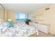Comfortable bedroom featuring views of the water at 5729 Puerta Del Sol S Blvd # 185, St Petersburg, FL 33715