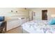Bedroom featuring built-in storage and an ensuite bathroom at 5729 Puerta Del Sol S Blvd # 185, St Petersburg, FL 33715