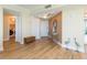 Bright entryway featuring wood floors, decor, and easy access to in-unit laundry at 5729 Puerta Del Sol S Blvd # 185, St Petersburg, FL 33715