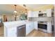 Modern kitchen with stainless steel appliances and bright countertops at 5729 Puerta Del Sol S Blvd # 185, St Petersburg, FL 33715