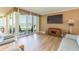 Comfortable living room with sliding glass doors and views of the water at 5729 Puerta Del Sol S Blvd # 185, St Petersburg, FL 33715