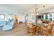 Inviting interior showcasing an open layout with combined living, dining, and kitchen areas at 5729 Puerta Del Sol S Blvd # 185, St Petersburg, FL 33715