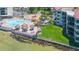 A luxurious pool with tiki umbrellas offers a relaxing retreat by the water at 5729 Puerta Del Sol S Blvd # 185, St Petersburg, FL 33715