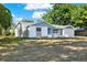 Charming one-story home with a front yard at 6017 6Th Ave, New Port Richey, FL 34653