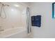 Clean bathroom with tub, shower, and nautical-themed decor at 6081 Bahia Del Mar Cir # 452, St Petersburg, FL 33715
